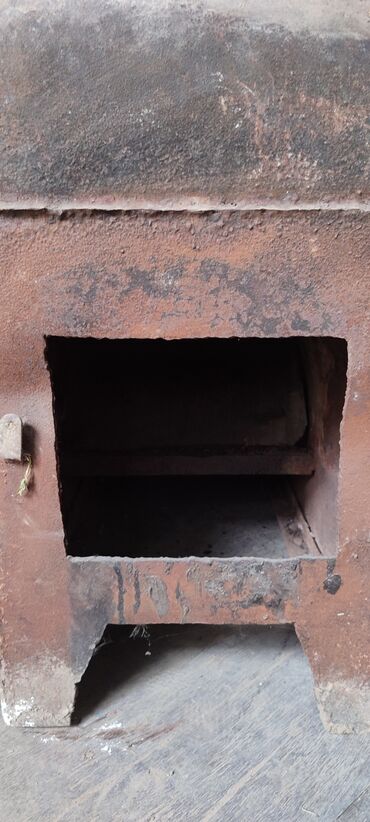 аэратор для газона: Металлическая печь-буржуйка с дымоходом - Материал: сварная стальная