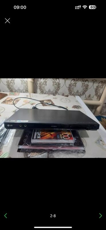 Продаю DVD LG модель DKS-9000 проигрыватель с караоке диск на 4000
