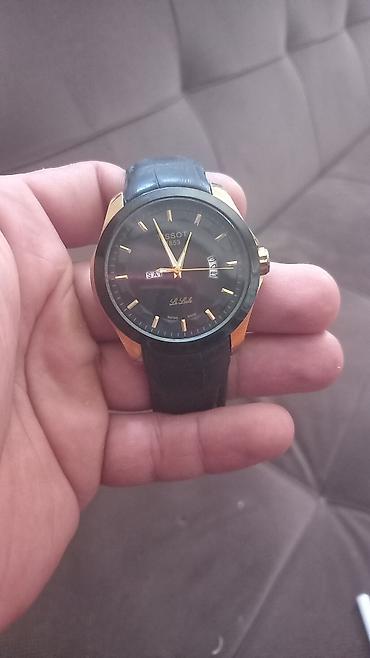 tissot 1853 saat: Tissot Le Locle qol saatı - Klassik üslubda, qara siferblat və qızılı — 1