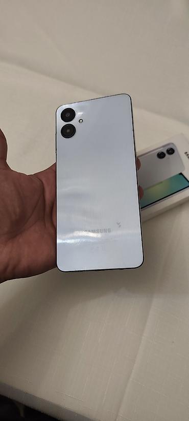 samsuk s20: Samsung Galaxy A06, 64 GB, rəng - Ağ, Sensor, Barmaq izi, İki sim kartlı — 1
