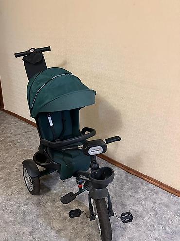 трицикл желмаян: Детский трёхколёсный велосипед-коляска Stilumax (зеленый) - — 1