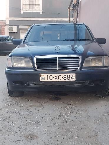 mersedes a klas: Mercedes-Benz C-Sinif sedan (W202), tünd mavi rəng. - Kuzov: 4 qapılı — 1