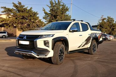 машины за 4000 долларов: Mitsubishi L200: 2023 г., 2.4 л, Механика, Бензин, Пикап