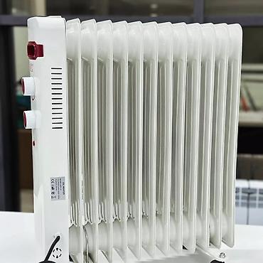 Масляные обогреватели: Масляный обогреватель Кол-во секций: 7, Быстрый нагрев, Встроенный вентилятор, Несколько режимов мощности — 11