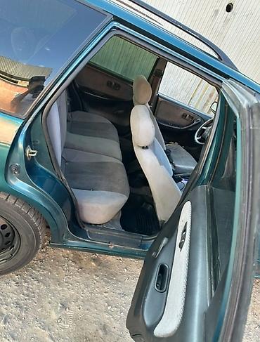 ac: Nissan Primera: 1996 г., 2 л, Механика, Бензин, Универсал — 6