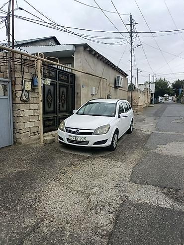 w210 on bufer: Opel Astra: 1.6 l | 2009 il 306000 km Universal — 1