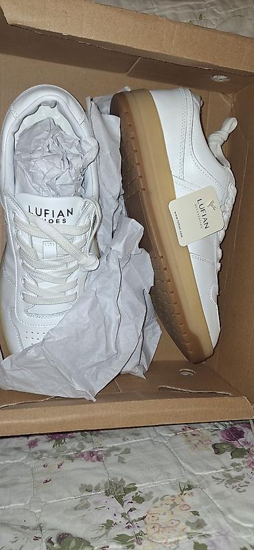 lufian: Məhsul: Lufian unisex idman ayaqqabısı Misirdə istehsal olunmuşdur. - — 1