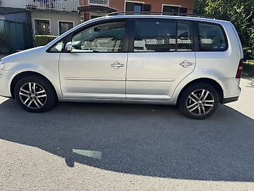 auto srbija.rs: Volkswagen Touran – porodični MPV, srebrna boja. - Motor i pogon — 10