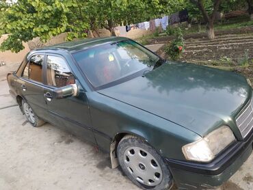 авто из кореи в наличии в бишкеке: Зеленый седан Mercedes-Benz C 180 с четырьмя дверями и четырьмя