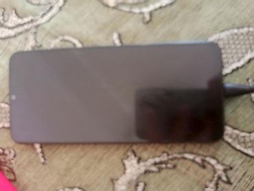 magic 4 pro: Redmi smartfon Qara rəngli Redmi markalı smartfondur. Arxa hissəsində — 2