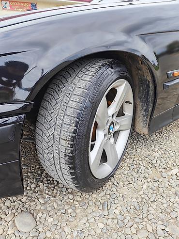 BMW: BMW 3 Series E36 sedan – tünd qara rəngdə, aerodinamik arxa spoylerli — 2