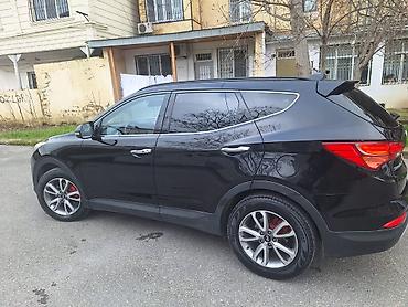 ford focus hatchback: Hyundai Santa Fe: 2 l | 2014 il Krossover — 9