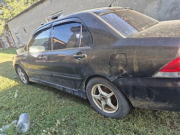 велтмейстер авто: Mitsubishi Lancer: 2004 г., 1.6 л, Механика, Седан — 3
