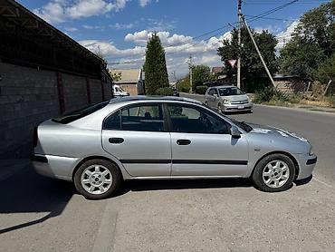 на 124: Mitsubishi Carisma: 2000 г., 1.9 л, Автомат, Бензин, Седан — 5