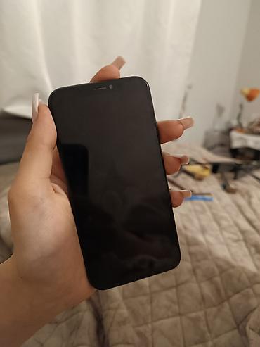 iphone xs black: IPhone Xs, 256 GB, Black Titanium — 1