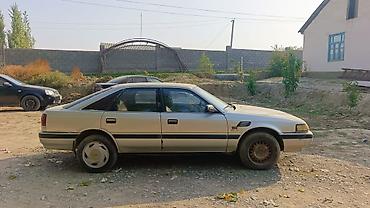 nisan leaf: Mazda 626: 1990 г., 2.2 л, Механика, Бензин, Хэтчбэк — 1