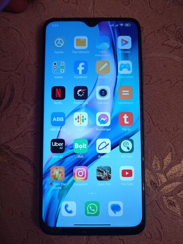 telefon fly ff 243: Xiaomi Redmi 9T, 64 ГБ, цвет - Голубой, 
 Отпечаток пальца, Две SIM карты, Face ID