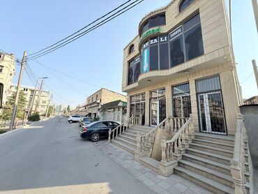 Kommersiya daşınmaz əmlakının satışı: Bu kommersiya binası şəhərin dinamik ərazisində yerləşir və geniş