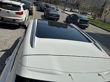 Porsche: Ağ rəngdə olan Porsche Cayenne avtomobili. Qabaq tərəfində duman -da lalafo.az — 9 Porsche: Ağ rəngdə olan Porsche Cayenne avtomobili. Qabaq tərəfində duman — 9