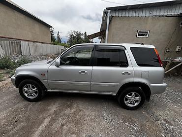 машина гибрид марки: Honda CR-V: 1999 г., 2 л, Автомат, Бензин, Кроссовер — 5