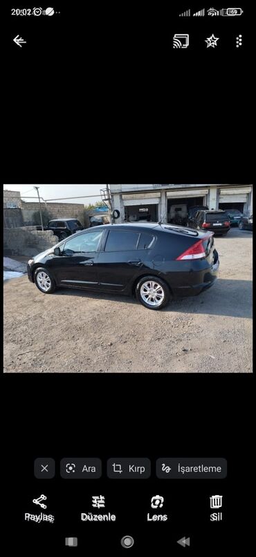 500 manata masin satiram: Honda Insight: 1.3 l | 2009 il Sedan