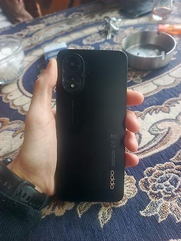 oppo 14f: Oppo A38, rəng - Qara, Barmaq izi — 2