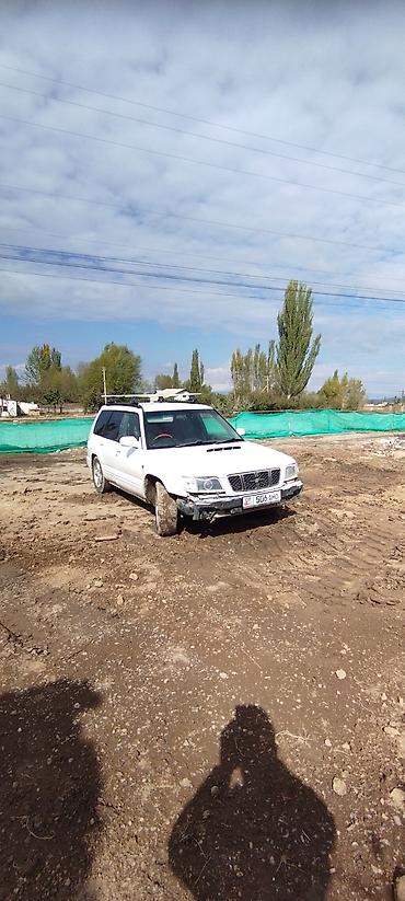 салон автомобиля: Subaru Forester: 2001 г., 2 л, Автомат, Бензин, Кроссовер — 8