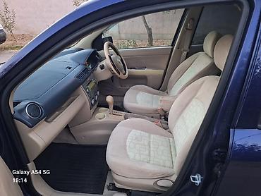 mazda 325: Mazda Demio: 2003 г., 1.3 л, Автомат, Бензин, Хэтчбэк — 9