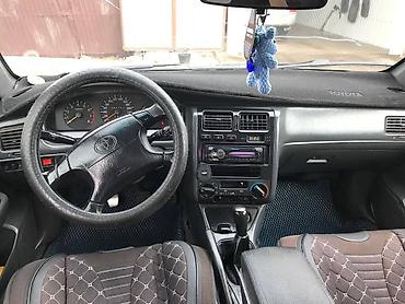 приус тайота: Toyota Carina E: 1997 г., 1.8 л, Механика, Бензин, Хэтчбэк — 5