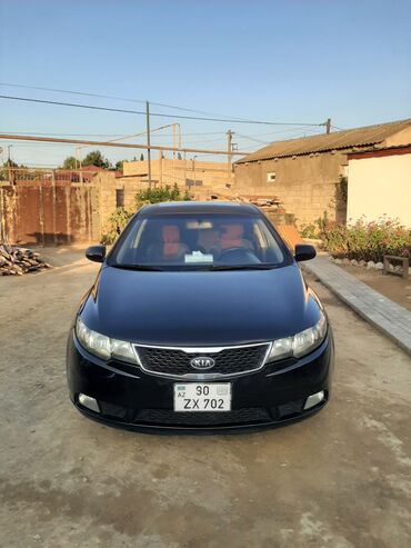 Kia Cerato: 1.6 л | 2010 г. Седан