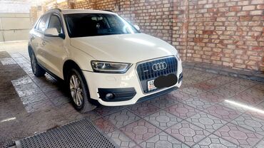обмен на авто с доплатой: Белый кроссовер Audi Q3 с характерной радиаторной решеткой и четырьмя