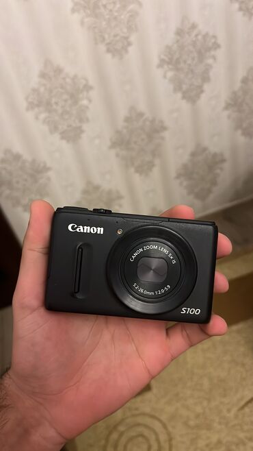 фотоаппарат canon ixus 145: Canon s100 satılır.Dəyərindən qat-qat ucuz.Hər bir şeyinə qarantiya