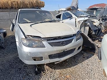 капот демио: Mazda Familia/323 BJ (универсал) — автомобиль на разбор Модель и — 1