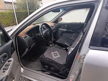 maz: Mazda : 2003 г., Автомат, Бензин, Седан — 5