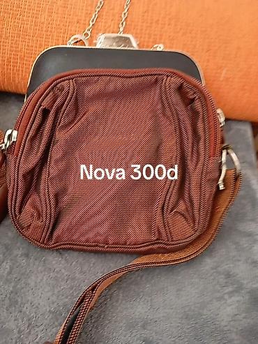 Putni koferi i torbe: Set torbi i tašni – više modela - Elegantna crna tašnica sa metalnim — 1