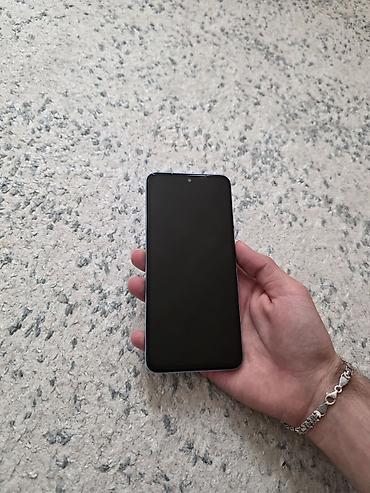 Üst geyimləri: Redmi 12s 256gb yaddas 12 ram prablemsiz zamanet var bater var — 2