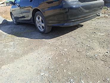 киа палисат: Задний бампер с губой (юбка) для седана Toyota Camry XV30 (2002–2006) — 2