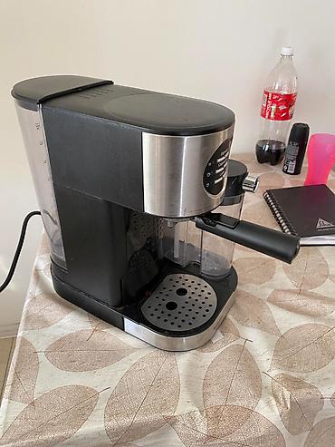 ajfon 9: Espresso kafe aparat sa posudom za mleko 
Upola cena kucno koriscen — 2