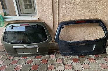 трибут: Крышка багажника Mazda tribute 
Жашыл 7000 баасы 
Көк 5000 — 3