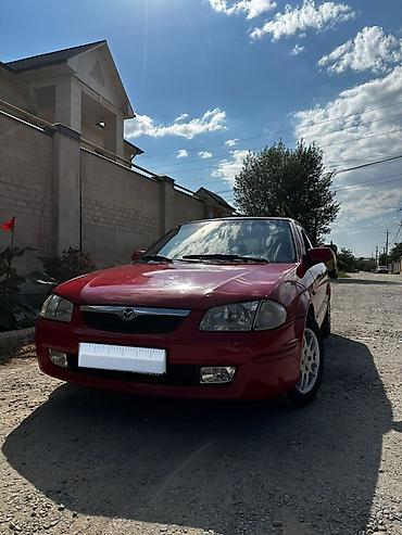 e6 3: Mazda 323: 1999 г., 1.8 л, Автомат, Бензин, Хэтчбэк — 7