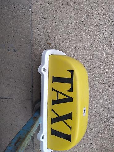 col reklamı: Taksi dam üstü işıq lövhəsi - Rəng: sarı fon, qara “TAXI” yazısı - — 1