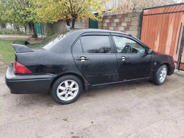 Mitsubishi: Mitsubishi Lancer: 2001 г., 1.5 л, Автомат, Бензин, Седан