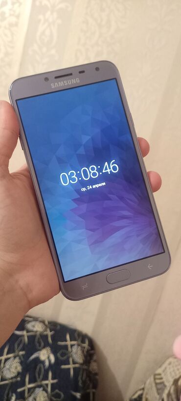 Samsung: Samsung J400, 32 ГБ, цвет - Синий, Сенсорный, Отпечаток пальца, Беспроводная зарядка