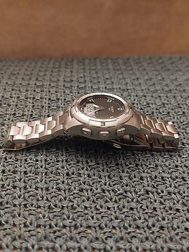 Şəxsi əşyalar: Tissot T‑Touch (Swiss Made) T047420 Barometr ve altimeter ara bir — 2