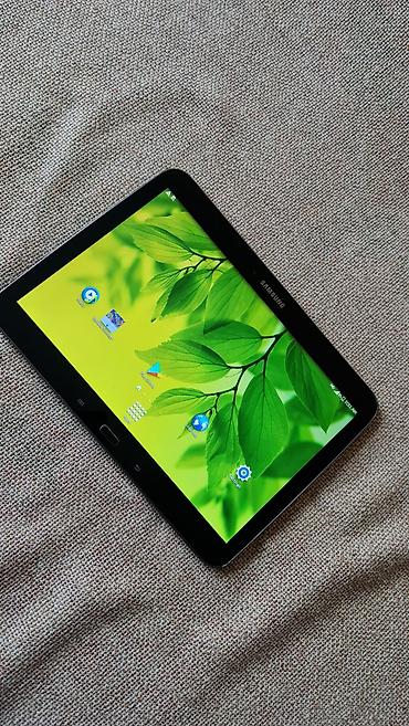 Tableti: Samsung Galaxy Tab (serija Tab 4/Tab E izgled) – 10.1" Android tablet — 1