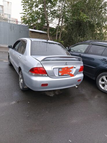 Mitsubishi: Mitsubishi Lancer: 2004 г., 1.6 л, Механика, Бензин, Седан