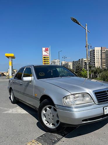 mersedes peci: Mercedes-Benz C 200: 2 l | 1995 il Sedan — 1