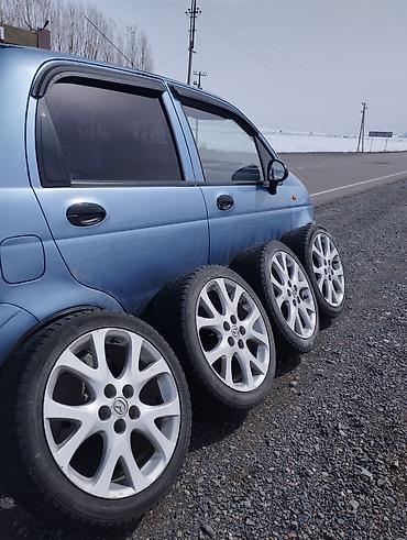 385 55: Комплект из 4 легкосплавных дисков Mazda с шинами. 5*114 — 4