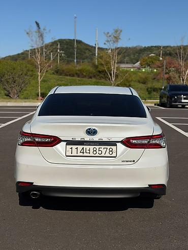 es lexus: Toyota Camry: 2021 г., Гибрид, Седан — 7