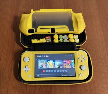 нинтендо: Nintendo Switch lite + 14 oyun Sarı rəngdə olan Nintendo Switch Lite